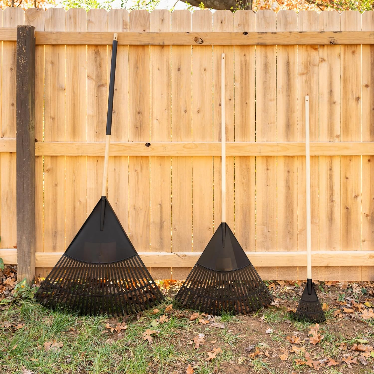 69ecdd95e4d8380dc0e621e2bc8945c273ef665e08d347453865c.jpg 8-inch Wooden-Handled Polyester Shrub and Leaf rake